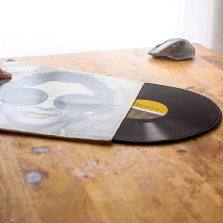 Each mousepad comes in it's own one-off random recycled record cover